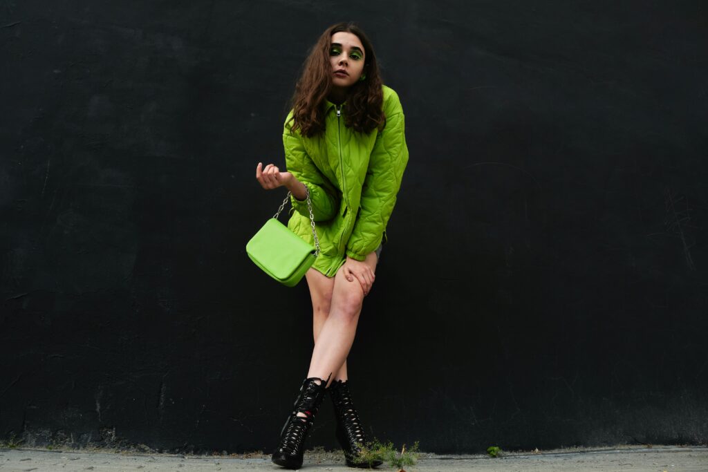 A woman rocking green.